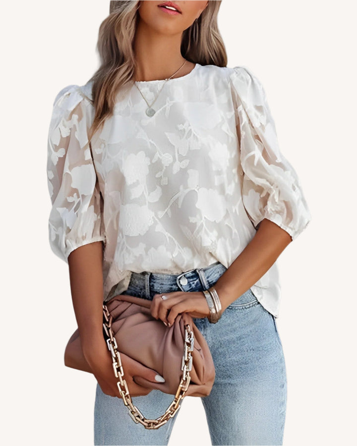 Camicetta donna elegante con maniche a sbuffo, perfetta per primavera estate e stile chic.
