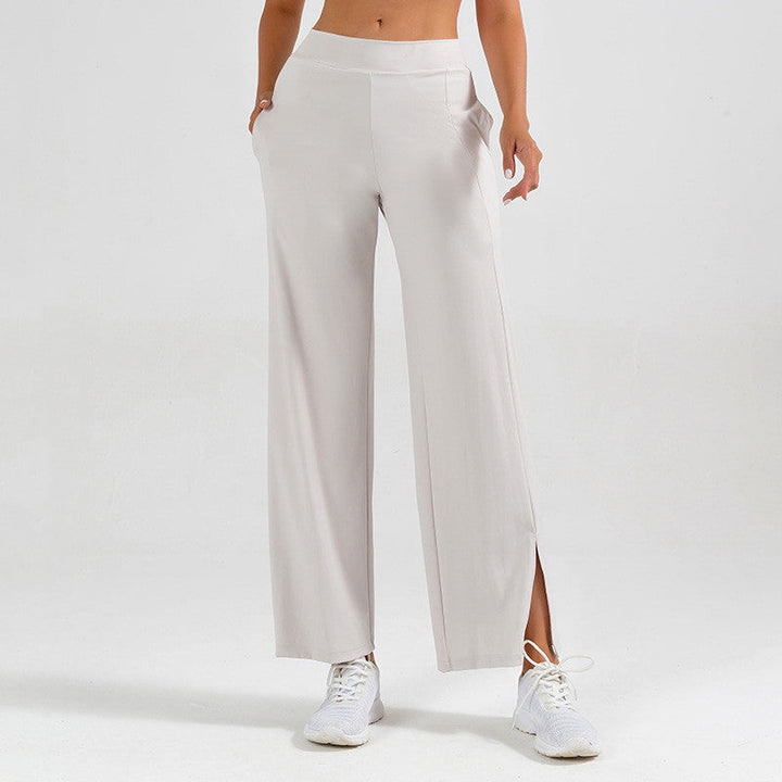 Pantaloni donna con spacco laterale, a zampa d'elefante, ideali per sessioni di yoga e un look casual.