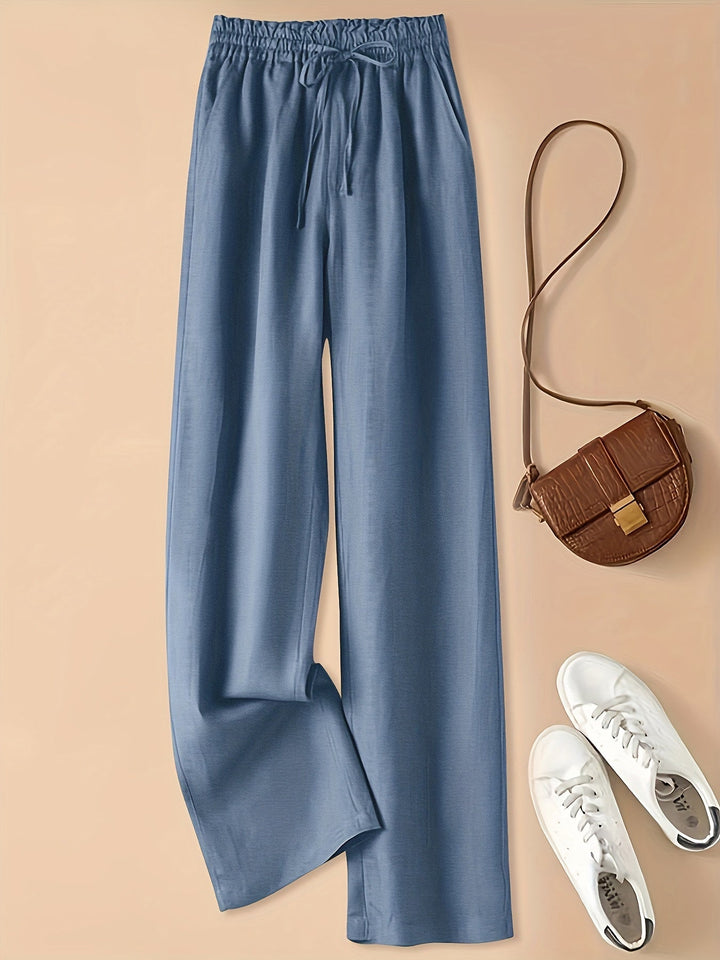 Pantaloni donna marroni, relaxed fit con tasche, vita alta e coulisse, un must-have estivo versatile.