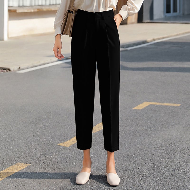 Pantaloni donna affusurati a vita alta, versatili per outfit eleganti, casual o professionali da ufficio.