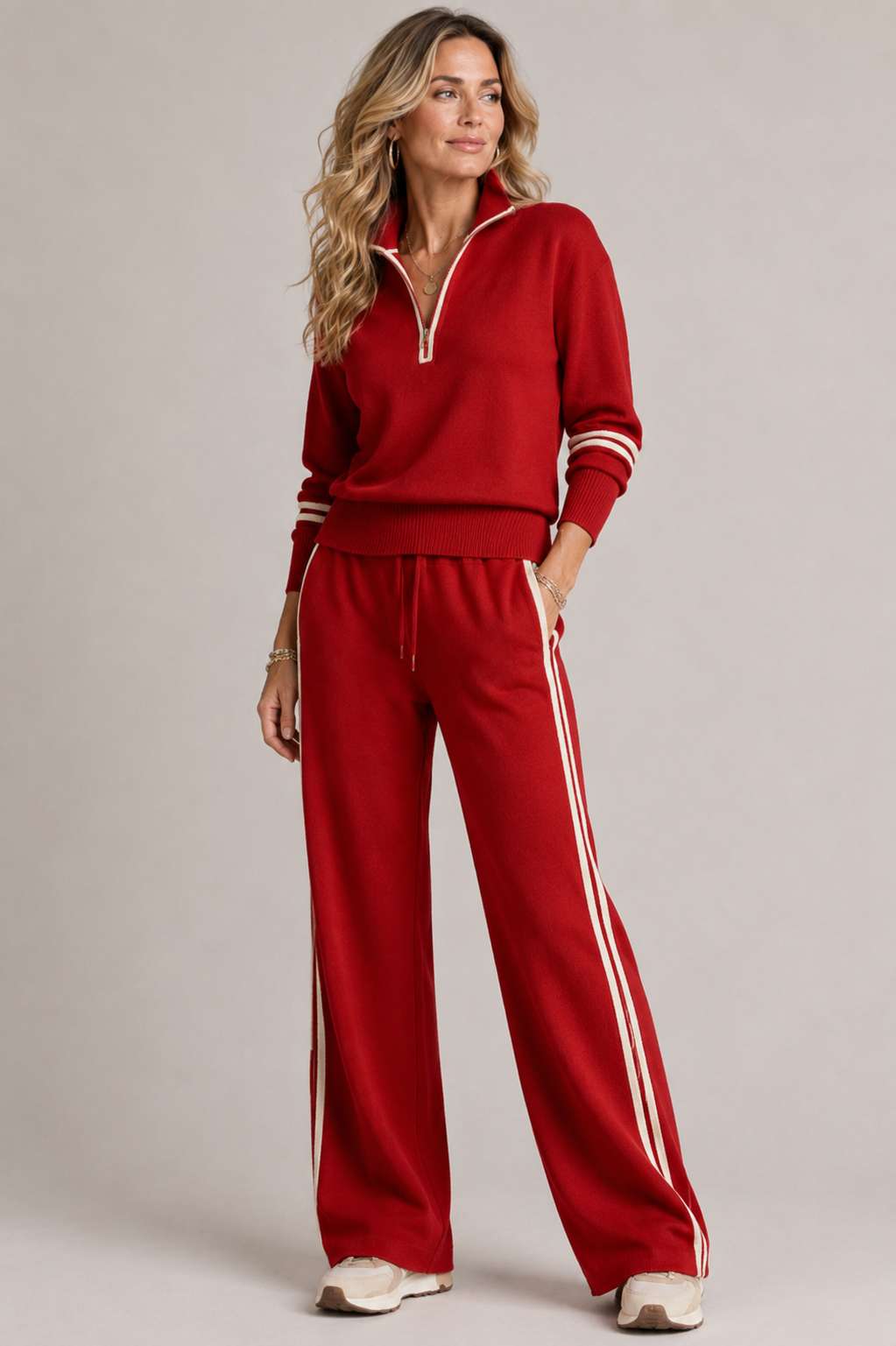 Set sportivo donna viola: felpa con zip e pantaloni comodi per il tempo libero e abbigliamento rilassato.
