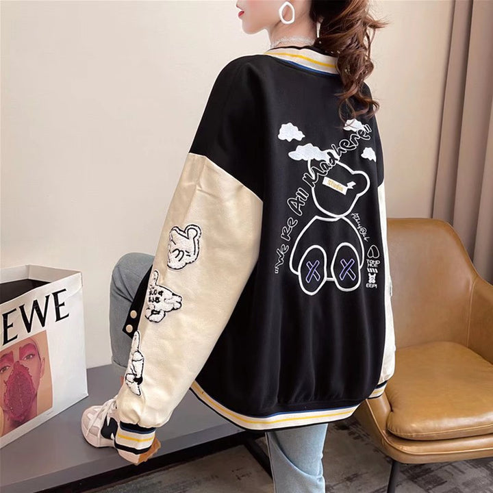 Giacca casual da donna con stampa cartoon, maniche lunghe. Versatile per outfit quotidiani di mezza stagione.