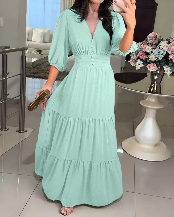 Abito donna femminile con volant e maniche 3/4, design elegante per un look raffinato.