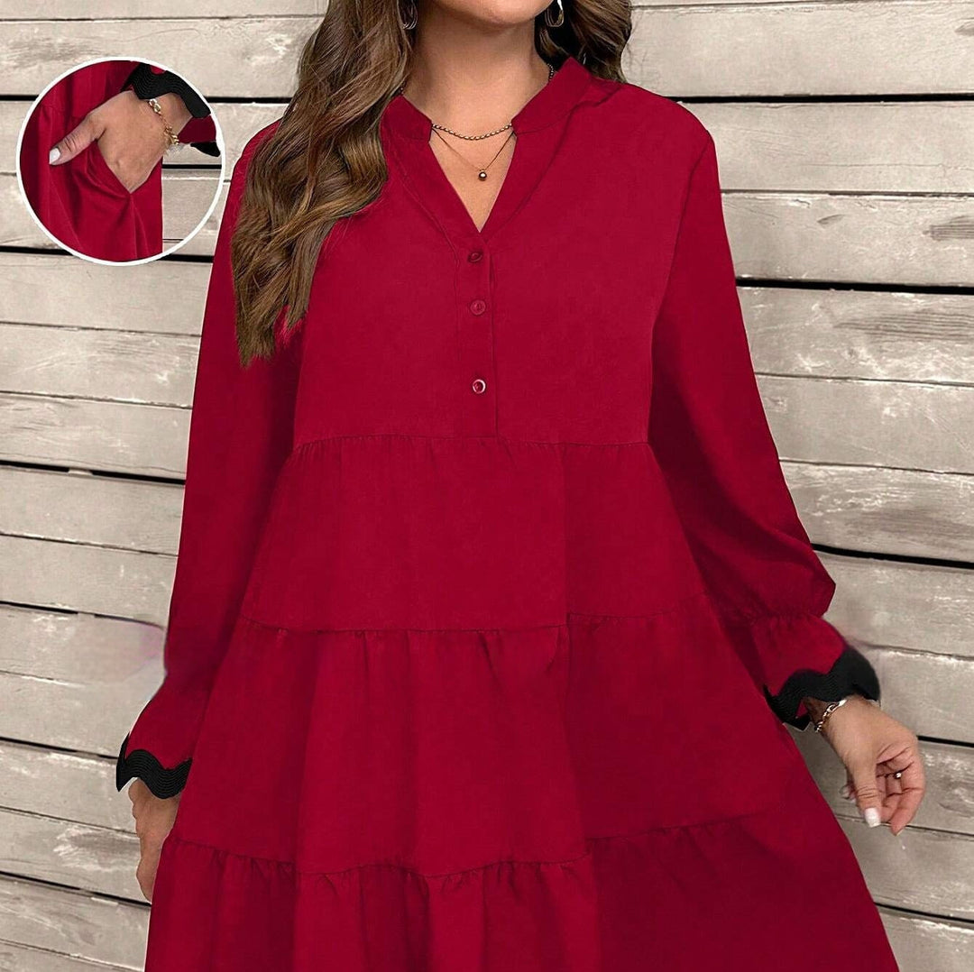 Elegante abito midi da donna in nero, con scollo a V profondo e maniche lunghe. Perfetto per ogni occasione.