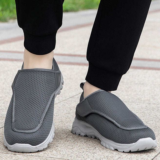 Scarpe uomo comode per passeggiate, design a pianta larga, garantiscono stabilità e comfort quotidiano.