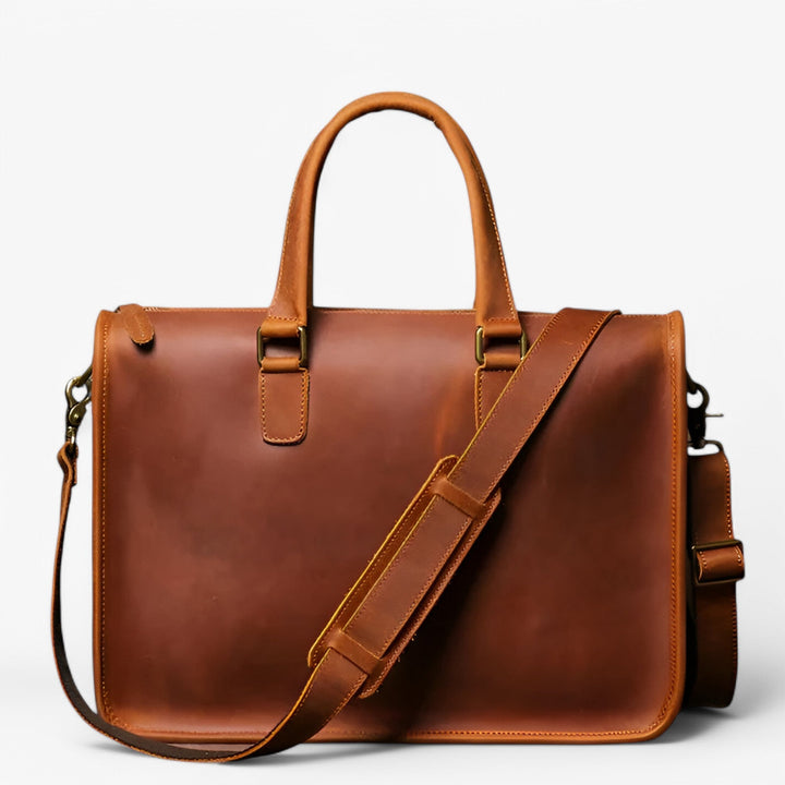 Borsa lavoro marrone con tracolla rimovibile; organizer interno per documenti e laptop, perfetta per l'organizzazione.