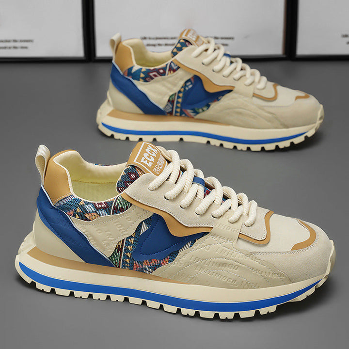 Sneakers uomo color block con design moderno e suola spessa ammortizzata. Ideali per il comfort casual e la moda.