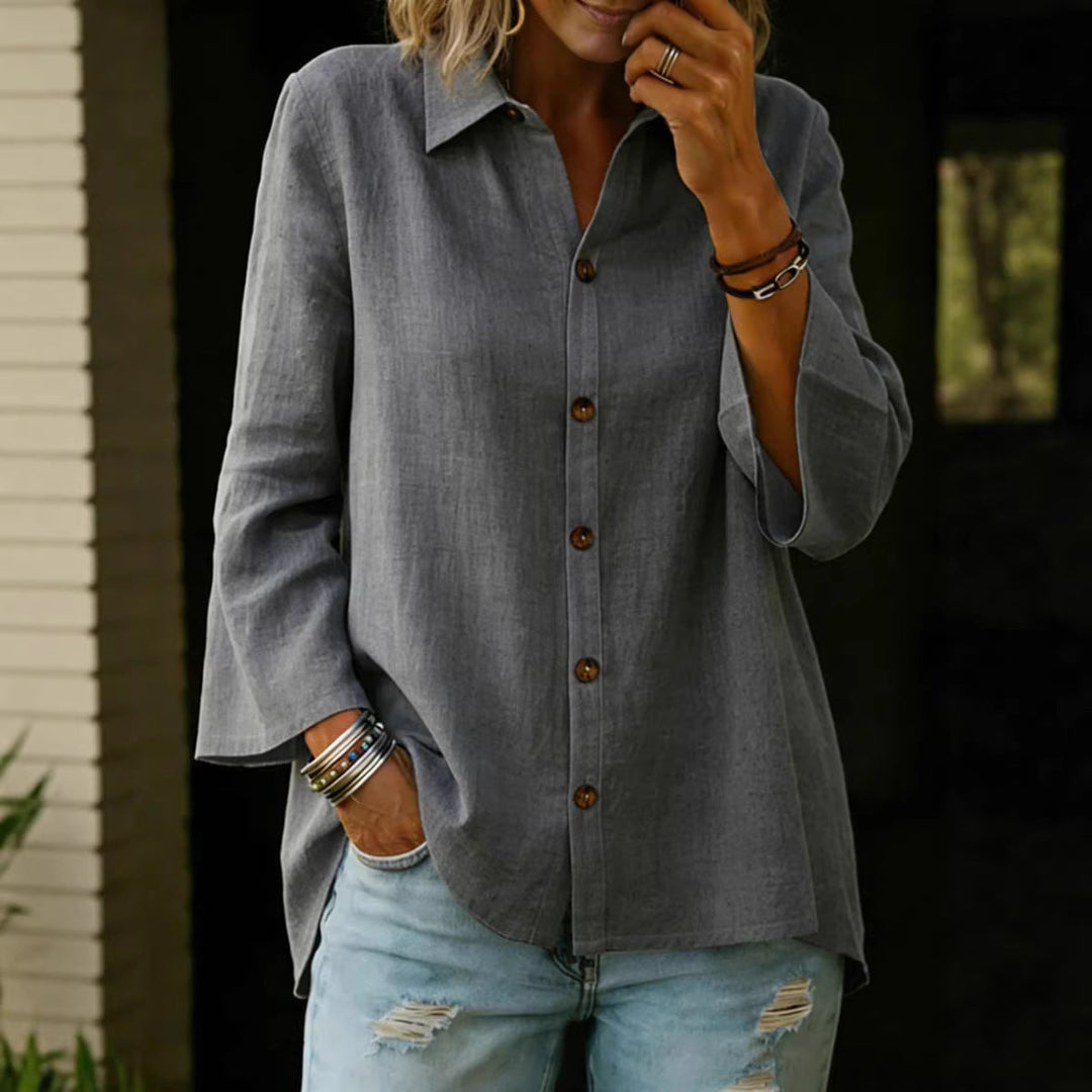Blusa monopetto da donna, manica tre quarti, in tinta unita per un look chic e casual.