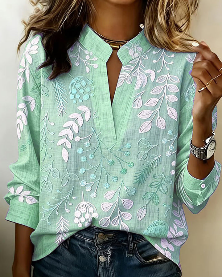 Blusa donna primaverile floreale, scollo a V, maniche tre quarti. Aggiunge un tocco di colore al tuo outfit.