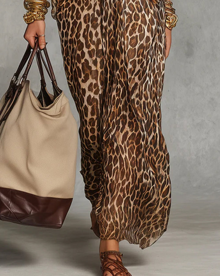 Vestito maxi leopardato da donna con nodo frontale, scollo V e maniche ampie, perfetto per l'estate.