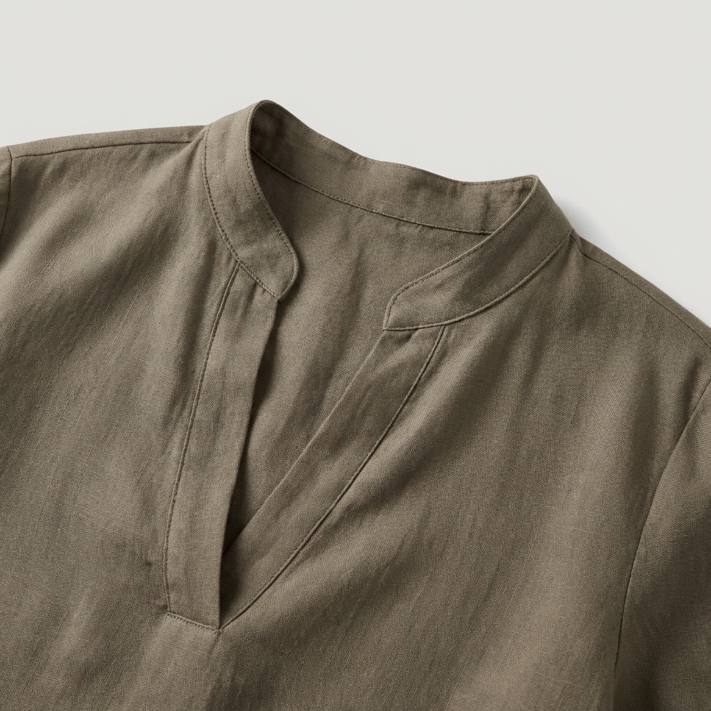 Blusa donna primaverile/estiva casual-chic. Scollo a V, maniche 3/4, orlo asimmetrico. Perfetta per ogni outfit.