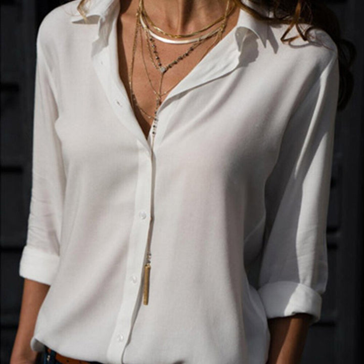 Camicia versatile da donna a maniche lunghe, con bottoni, adatta a ogni outfit elegante o casual.