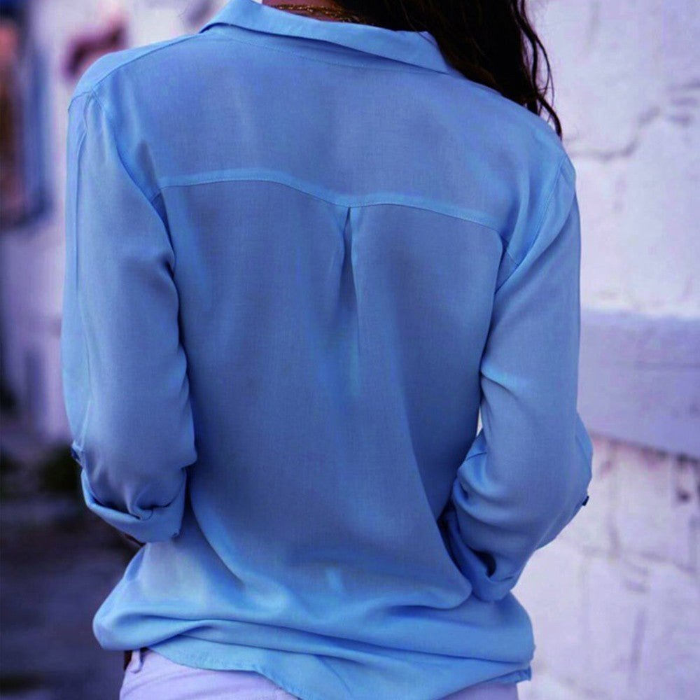 Camicia elegante da donna, modello classico con maniche lunghe e bottoni, perfetta per l'ufficio.