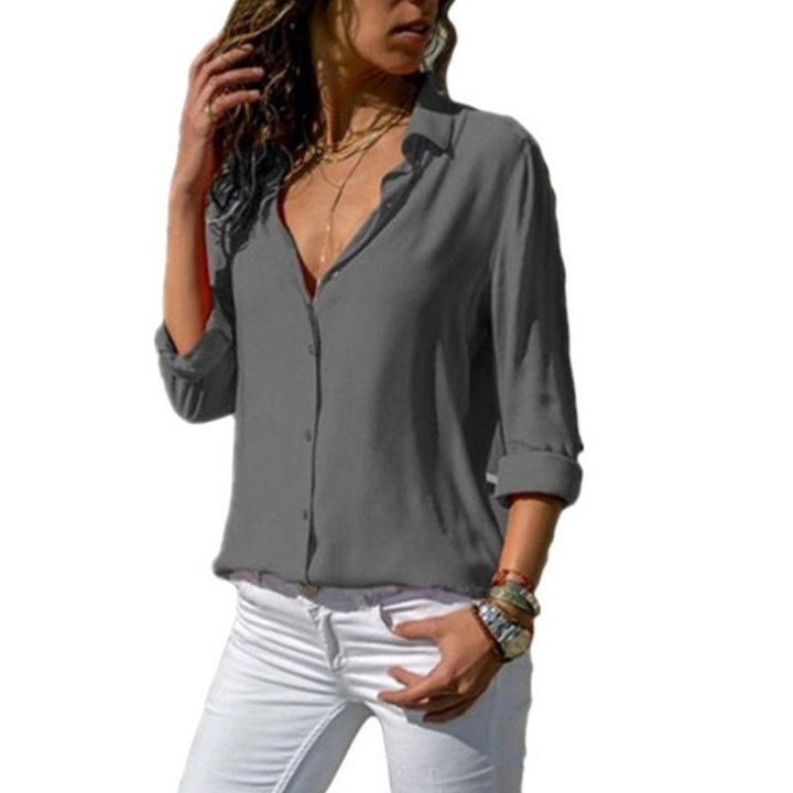 Camicia casual-elegante da donna, versatile, con maniche lunghe e colletto classico.