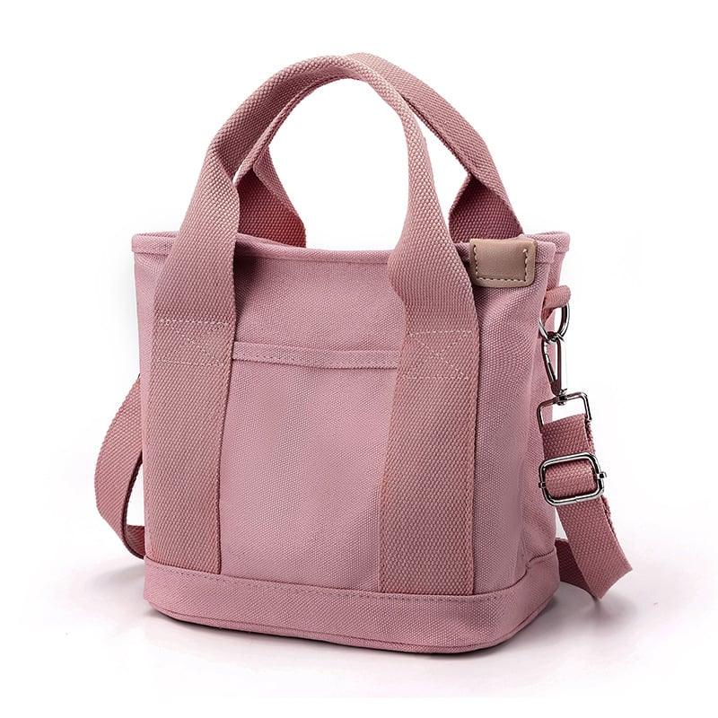 Pratica borsa a tracolla piccola in tela multicolore per donna, ideale per l'uso quotidiano e viaggi.