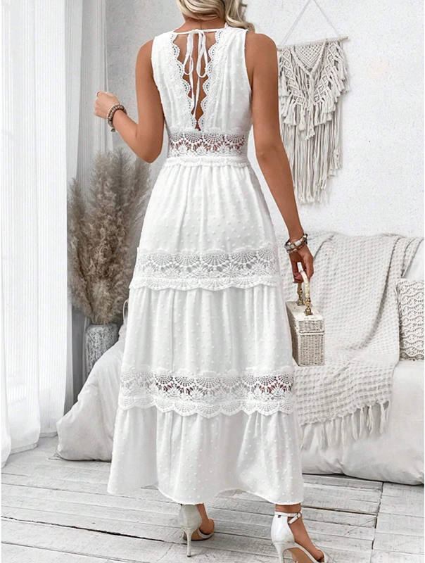Vestito da sera femminile in pizzo delicato con scollo a V, per un look chic e sofisticato.