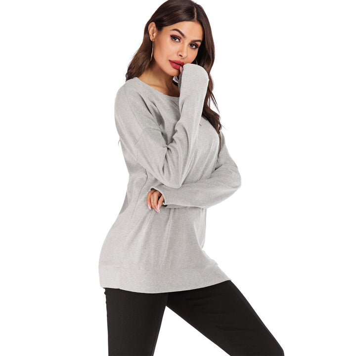 Maglione donna a tinta unita, silhouette rilassata, perfetto per layering invernale.
