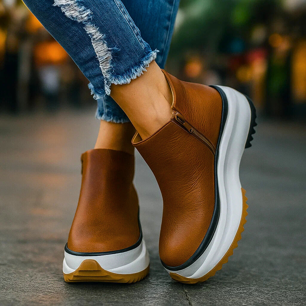 Comodi stivaletti platform neri da donna, scarpe con zip per autunno, stile casual e contemporaneo.
