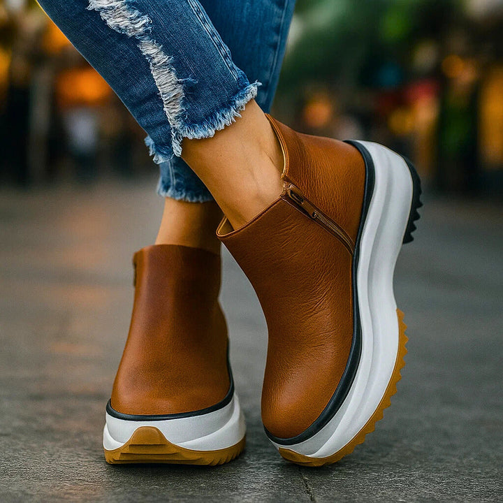 Comodi stivaletti platform neri da donna, scarpe con zip per autunno, stile casual e contemporaneo.