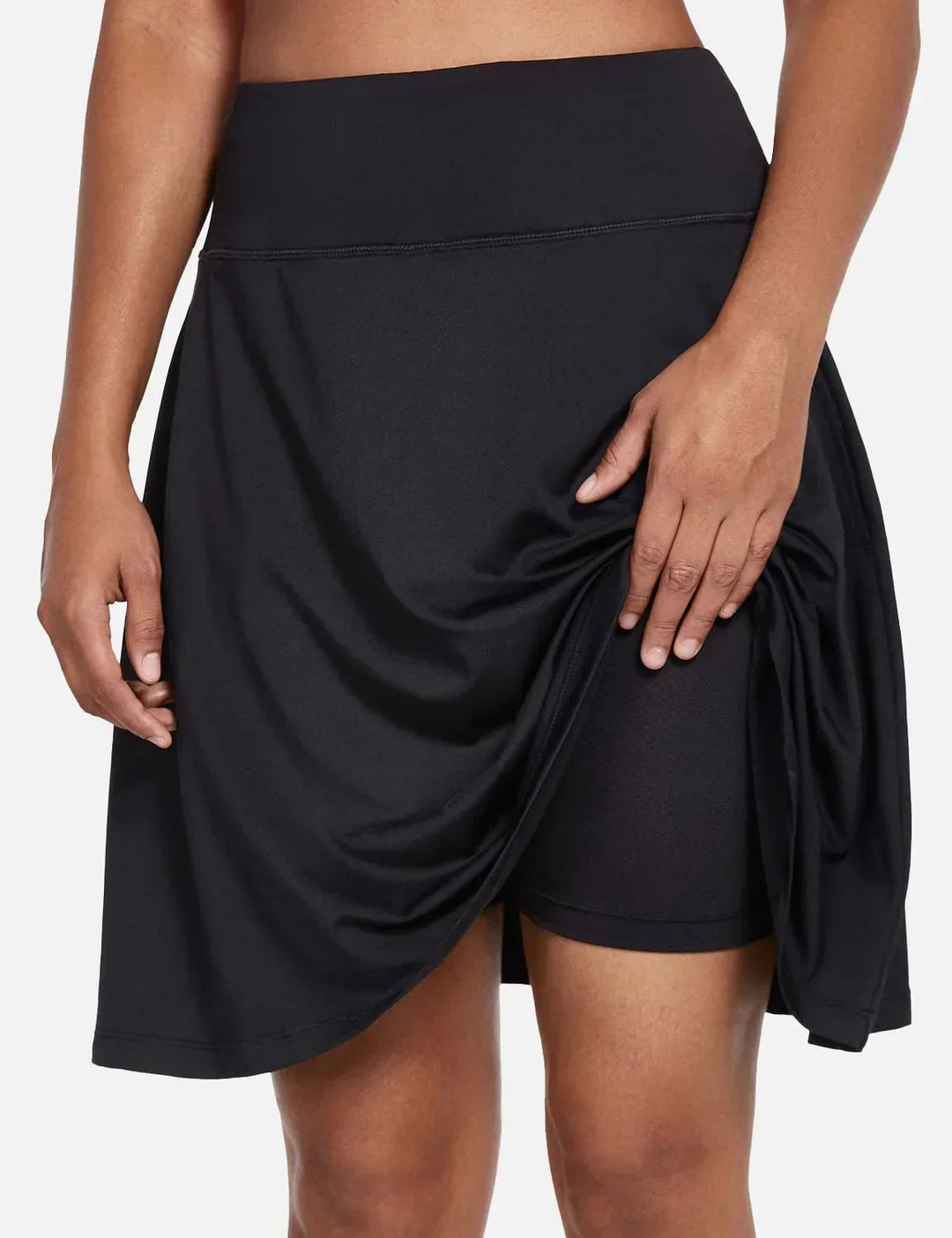 Gonna sportiva donna con shorts, vita alta, pieghe e tasche laterali, perfetta per l'estate.
