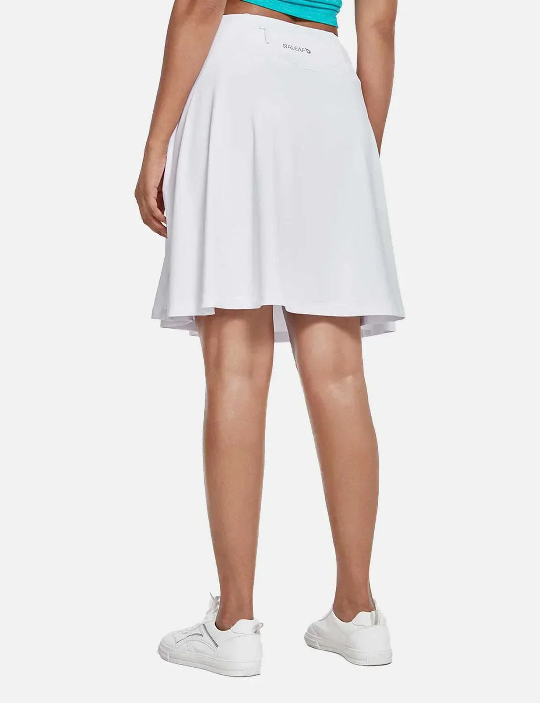 Skort donna con protezione UPF50+, vita alta, pieghe fluide e tasche, per look casual-sportivo.