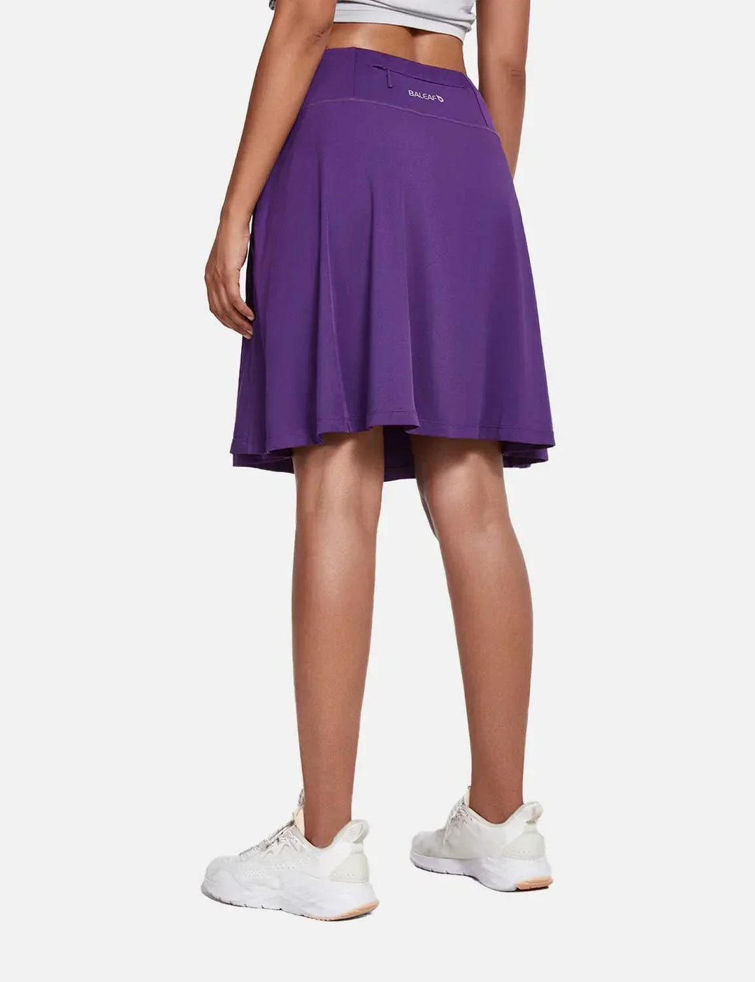 Gonna-pantaloncino donna vita alta, tasche e pieghe, per attività sportive o look casual estivo.