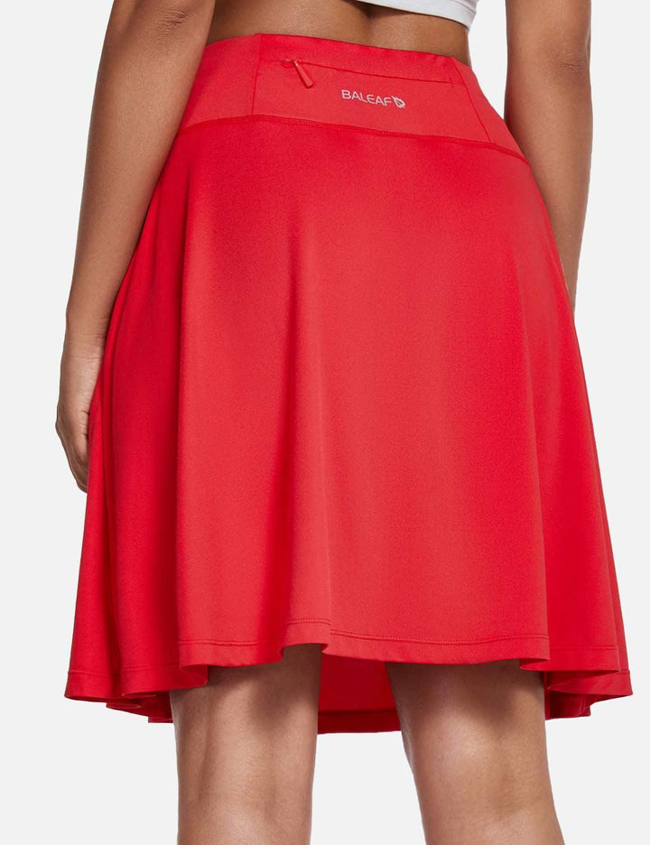 Gonna donna corta con pantaloncino, vita alta, tasche e pieghe, comfort estivo e stile sportivo.