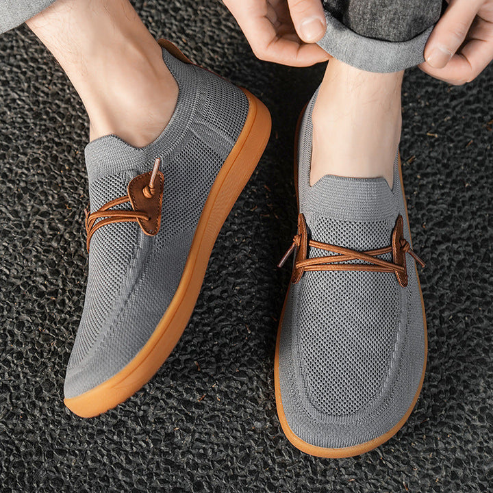Scarpe da passeggio uomo leggere e traspiranti, modello slip-on per massima praticità e comfort sportivo.