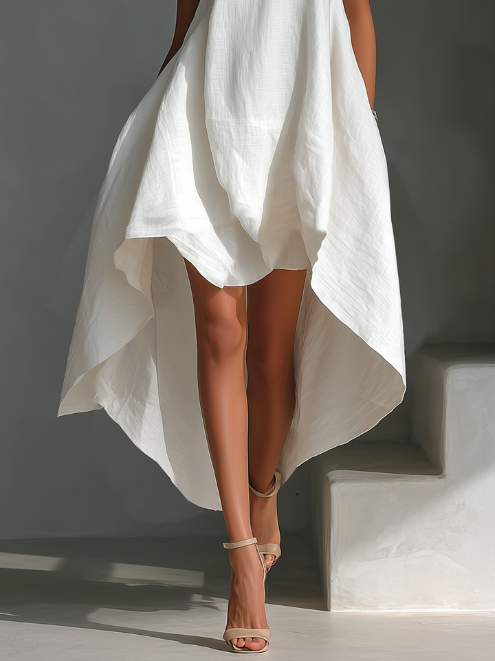 Abito da donna midi in lino, smanicato, fluido, con orlo asimmetrico, ideale per un'eleganza estiva.