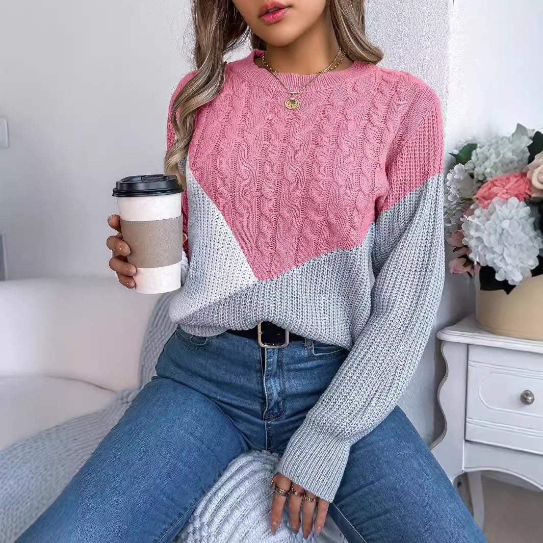 Morbido maglione donna rosa con scollo rotondo, maniche lunghe e design a maglia twist. Perfetto per il comfort quotidiano.