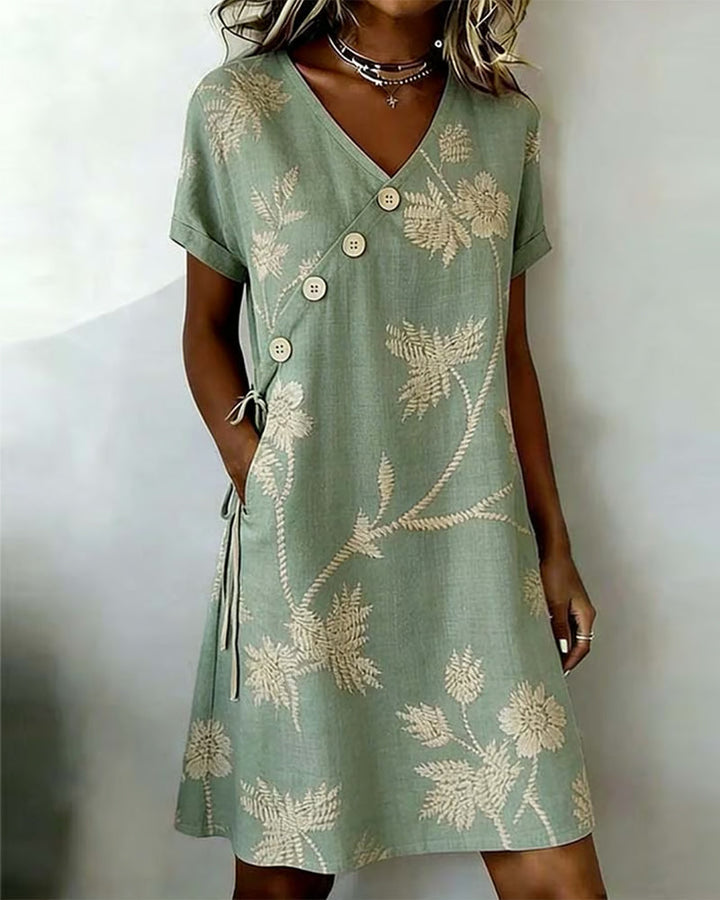 Abito floreale donna estivo con scollo a V, perfetto per eleganza e comfort quotidiano.