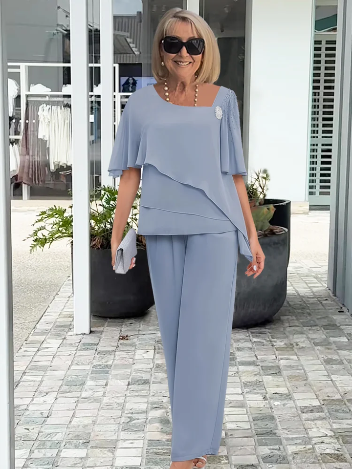 Pantalone dritto elegante, parte di un completo donna due pezzi. Ideale per outfit ufficio formale o casual chic.