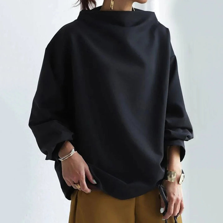 Maglione collo alto donna nero, ideale per look casual ed eleganti. Comfort e stile per moda femminile.