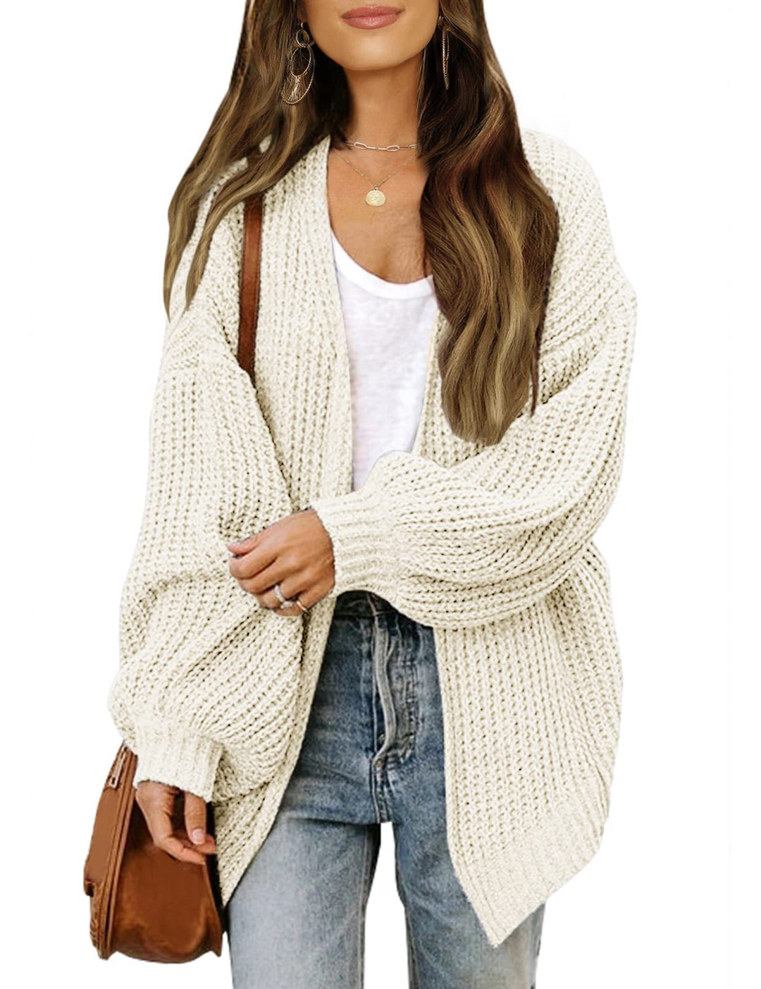 Cardigan donna oversize con maniche a lanterna ben visibili. Caldo, avvolgente, per giornate fredde.
