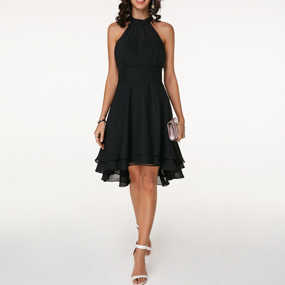 Abito donna corto con scollo all'americana, volant, vita aderente. Ideale per cocktail party e serate estive.
