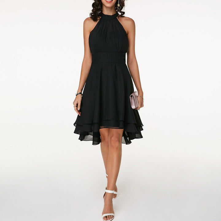 Abito donna corto con scollo all'americana, volant, vita aderente. Ideale per cocktail party e serate estive.