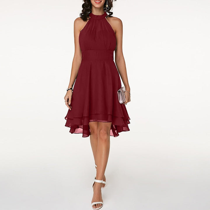 Mini abito donna senza maniche, con scollo all'americana, vita aderente e dettagli volant. Perfetto per la moda estiva.