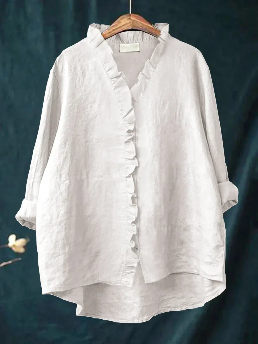 Top estivo donna oversize con scollo a V e maniche arrotolate, ideale per la moda femminile.