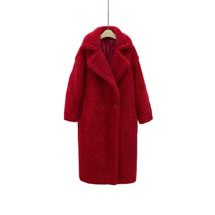 Giacca lunga invernale donna in nero, calda e chic, perfetta per un look elegante e di tendenza.