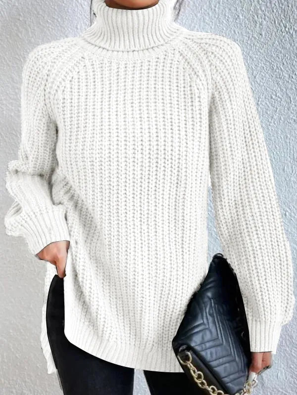 Moda donna: maglione dolcevita con maniche raglan, orlo spaccato, caldo e chic per ogni giorno.