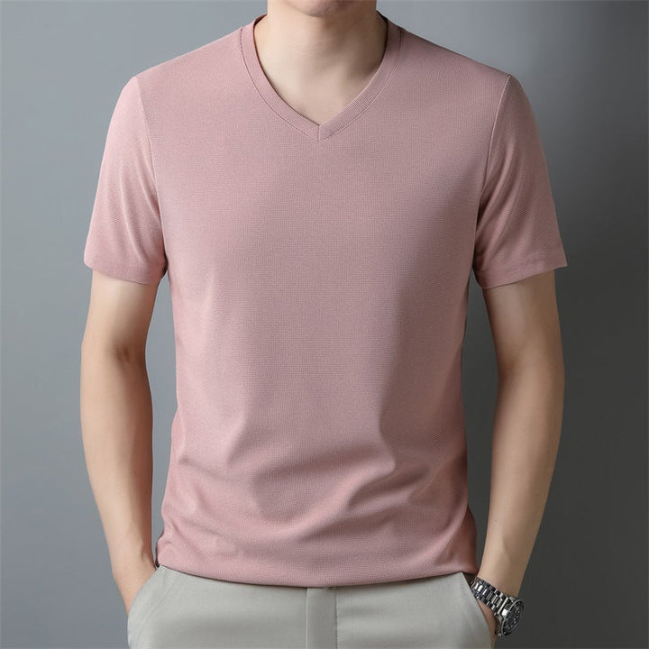 Maglietta uomo grigia, scollo a V, maniche corte. Stile quotidiano, vestibilità regolare e comfort per l'estate.