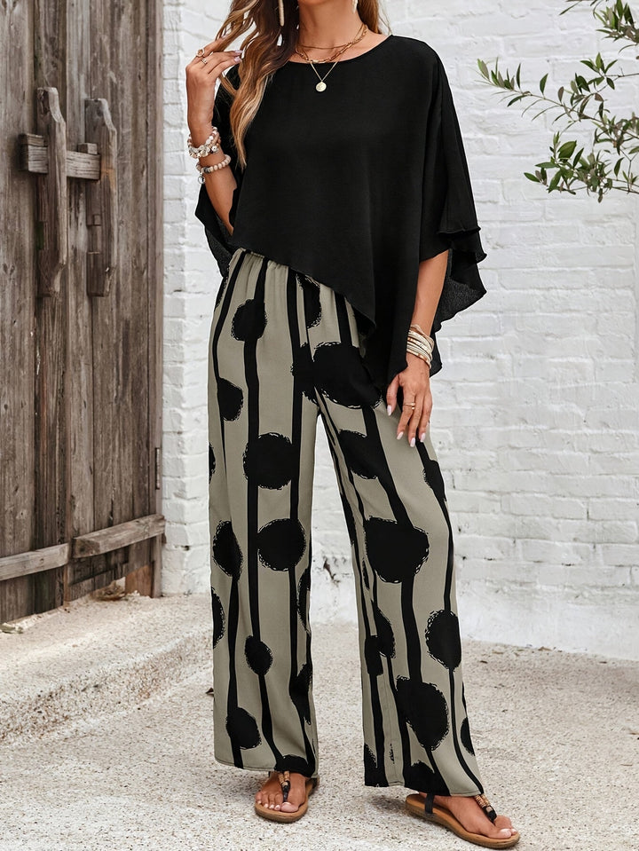 Pantaloni a gamba larga e top asimmetrico: un completo donna due pezzi boho chic, per un look primaverile.