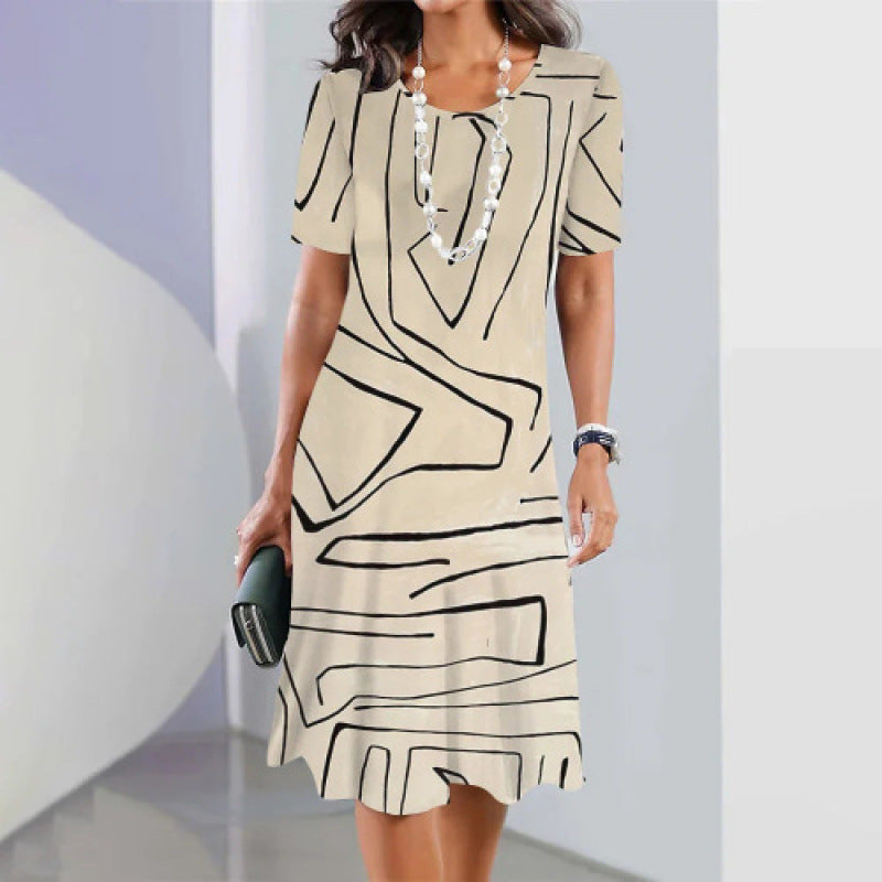 Abito trapezio donna in cotone con stampa geometrica moderna, elegante e comodo per la primavera.