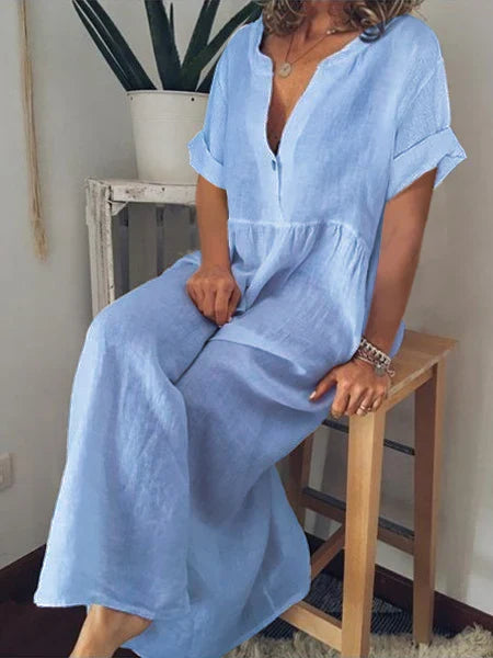 Maxi vestito estivo donna con scollo a V e maniche arrotolate, perfetto per comfort e stile casual.