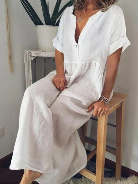 Elegante maxi vestito estivo fluido per donna, ideale per vacanze o look casual chic con scollo a V.