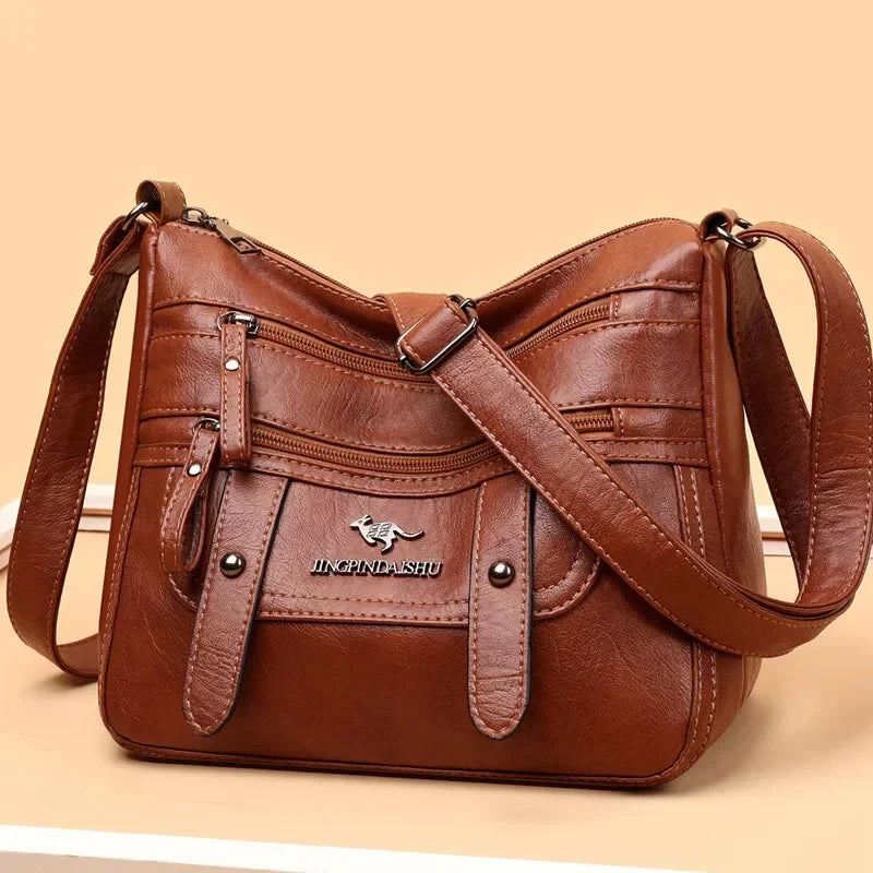 Borsa a mano in morbida pelle da donna, elegante e versatile, con tracolla opzionale.