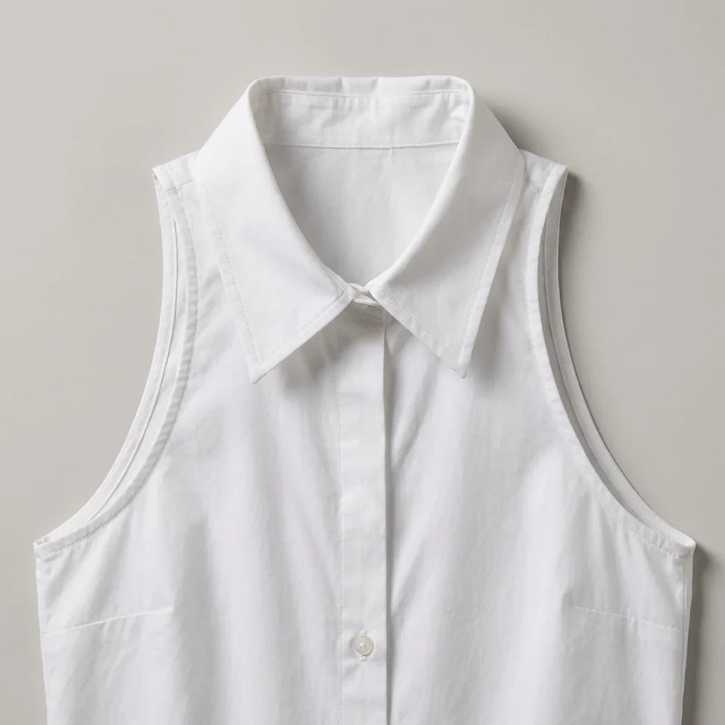 Top donna versatile, senza maniche, con colletto e taglio all'americana. Perfetto per ufficio o look casual-chic.