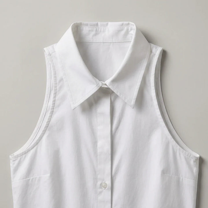 Top donna versatile, senza maniche, con colletto e taglio all'americana. Perfetto per ufficio o look casual-chic.