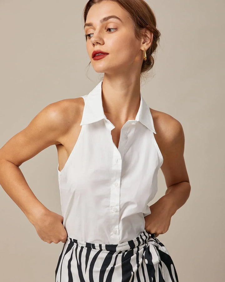 Camicia donna con colletto e abbottonatura all'americana, senza maniche. Stile sofisticato per la moda estiva.