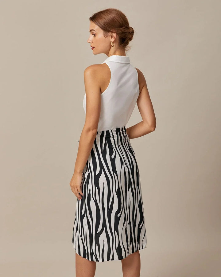Moderna camicia donna senza maniche, con colletto classico. Design all'americana per eleganza e comfort estivo.